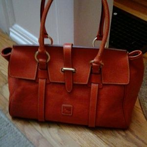 Dooney & Bourke roll tab